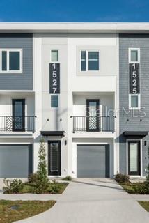 Great location just blocks from Downtown Tampa, I-275, I-4 and the Selmon Expwy. LOW HOA fees of ONLY $370 monthly and NO FLOOD INSURANCE REQUIRED! This beautiful 3 bedroom townhome has 3 full baths and one 1/2 bath. There is a one car garage and a fully fenced back yard with a patio area. It was built in 2020 and is NGBS Green Certified with Structurally Insulated Panels and a Membrane Roof. The first floor has an office/gym or bedroom with a walk in closet and full bath. The second floor has a beautiful kitchen featuring Energy Star Stainless Steel Appliances, a large island bar with granite counter top and a walk in pantry. It is open to the dining room and living area. The living area is wired for surround sound, has a lovely balcony and a guest bath with a window. The home has 9 ft ceilings through out and lots of windows for natural light. The third floor has the second bedroom which has it's own bath, the laundry room with full size washer and dryer and the primary bed and bath. All baths have modern fixtures and granite counter tops. The town home has Luxury vinyl through out with tile in the wet areas. Energy saving HVAC and Insulation currently keep electric bills between $150 and $190 monthly. Low HOA fee covers a lot! Low Insurance rates. Come check out your new Urban Living Lifestyle!