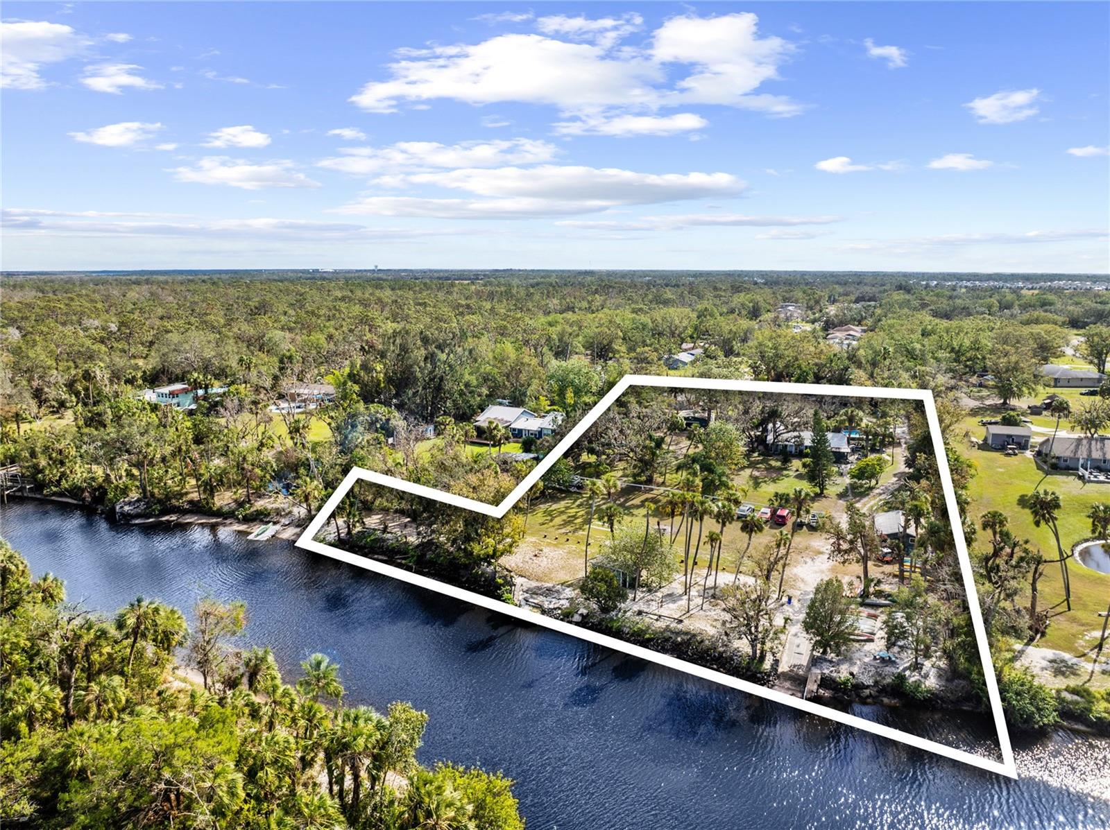 Riverfront Oasis Awaits! Unique Manatee River Haven with No HOA Restrictions!
** 2 acres on the water: Own 2 scenic acres along the stunning Manatee River!
** Vintage Charm Meets Opportunity: Own a 1950s Florida-style home with 3 bedrooms and 1 bathroom—preserved nostalgia ready for your modern vision!
** Buy a house, get a business: Buy a home and you get to also step into ownership of Ray’s Canoe Hideaway and Kayak Center—carry on a cherished tradition of adventure and riverfront fun!
** Stay Cool: Beat the heat with a refreshing above-ground pool!
** Wildlife Wonderland: Spot manatees, dolphins, otters, eagles, and egrets right from your backyard!
** Angler's Dream: Fish for striped bass, bream, and snook without leaving home.
** Ample Storage: Multiple outbuildings for classic cars, boats, and more.
** Ultimate Workshop: Garage equipped with an 8,000 lbs. lift station for all your projects. No HOA, No Restrictions: Embrace freedom and flexibility with no HOA or CDD fees!
** Prime Location: Just outside Lakewood Ranch and minutes from I-75 for convenience and seclusion.
Call now to schedule your private tour of this extraordinary riverfront oasis!