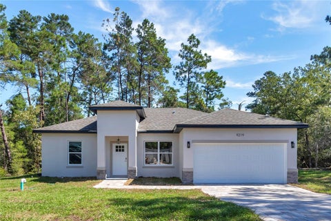 Photo of 9219 N Akola Way, Citrus Springs, FL 34434 (MLS # O6446105)