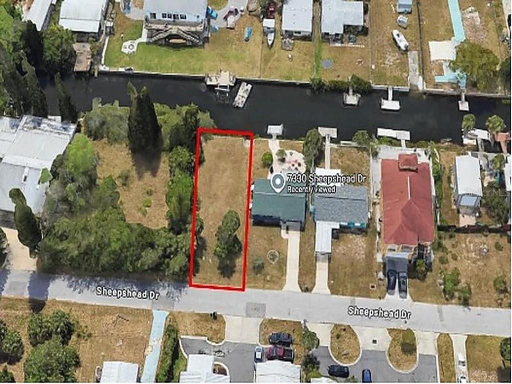 Photo of Sheepshead Drive, Hudson, FL 34667 (MLS # TB8428864)