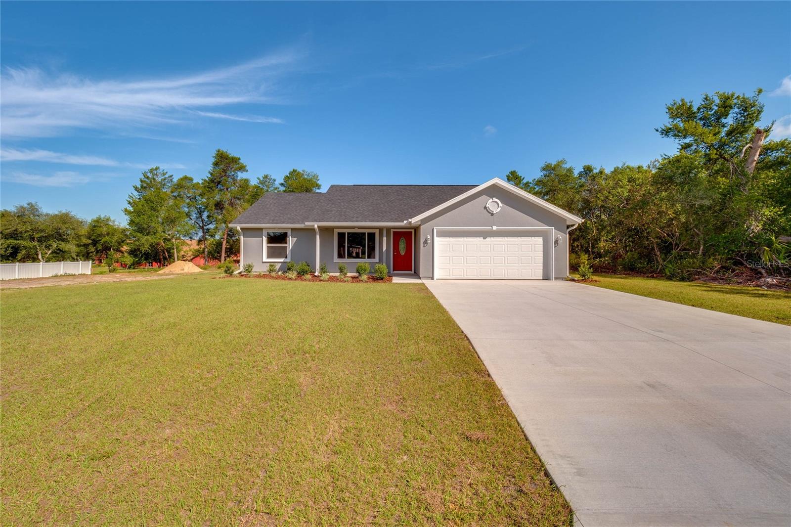 Immediate occupancy on this fabulous home in Marion Oaks! No detail was overlooked in this Gracie XL model. From the soft close cabinets, granite throughout, recessed lights in each room, and stainless steel appliances, this house was built to impress! Located in a quiet corner of Marion Oaks, you'll look forward to coming home every day this amazing home. (House shown is another completed Gracie XL model...colors and finishes may be different).