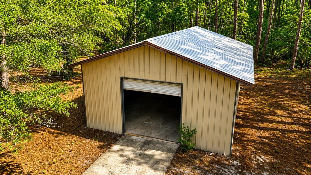 Photo of 11 NE Hwy 315, Fort Mccoy, FL 32134 (MLS # OM727989)