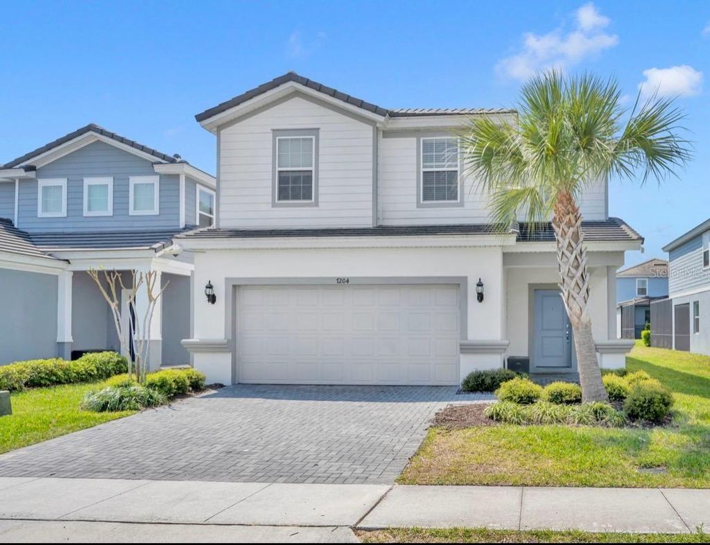 Photo of 7204 Oakmoss Loop, Davenport, FL 33837 (MLS # O6394455)