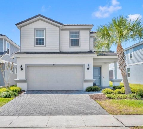 Photo of 7204 Oakmoss Loop, Davenport, FL 33837 (MLS # O6394455)
