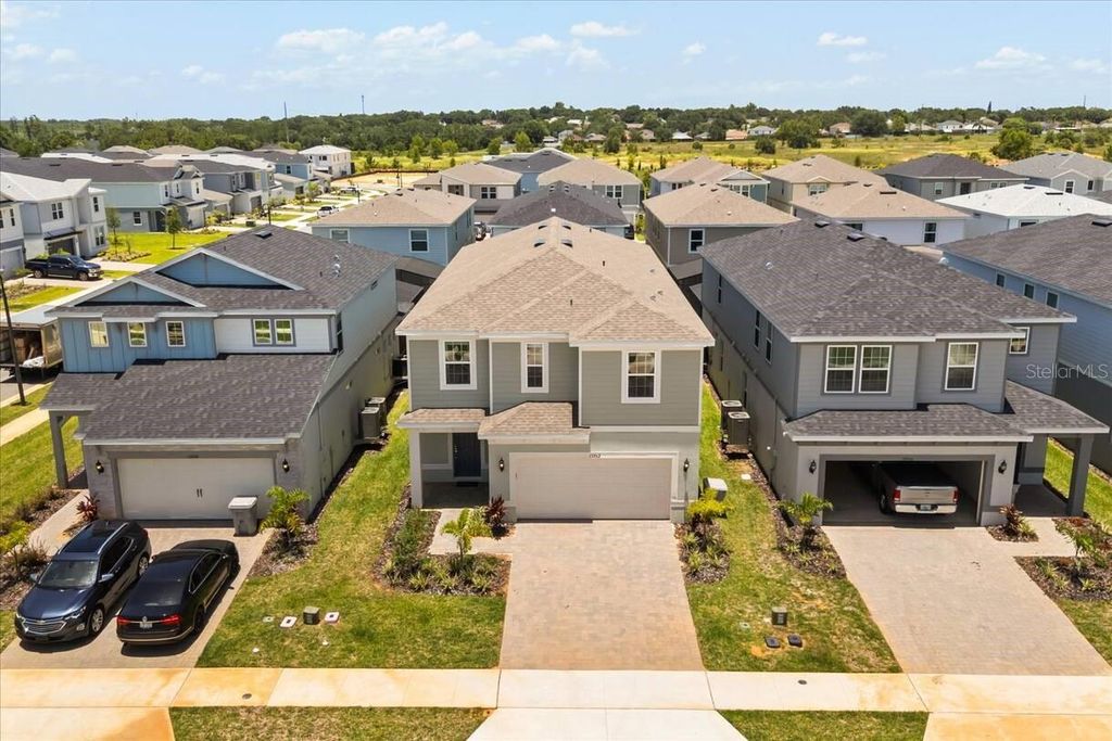 Photo of 15952 Cape Coral Loop, Clermont, FL 34714 (MLS # O6398801)