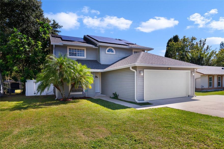 NEW PRICE! NEW ROOF [2023!] And SOLAR power that is already PAID FOR, makes your monthly utilities bill less than 50-dollars for most of the year!!  This house a great deal!! Enjoy this Spacious, beautiful, 4-bedroom home with many upgrades and tons of space for all! NO HOA!! Located on a quiet cul-de-sac street, this residence has had many upgrades including NEW PLUMBING [2023], FULLY PAID FOR- SOLAR Panels [2020] NEW ROOF [2023] Vinyl FENCE [2017], and SOLAR Powered HOT WATER HEATER [2017], Completely New AC [2017] plus a NEW Frigidaire Gallery Stove with BUILT-In Air Fryer [2023]. The kitchen has tons of storage, granite counters, and stainless appliances. EXCEPTIONALLY High 24' ceilings in the living room highlight a bright and airy interior that features neutral colors throughout. NEW INTERIOR PAINT [2023] NEW Carpets [2023] plus Water Softener System, Nest Thermostat, a Reverse Osmosis Water Filtration system, LED lights throughout, and Lutron Porch /Driveway Coach Lights. ENTIRE HOME is wired for CAT-6, increasing productivity for your home office! The 1st floor master bedroom is enormous with ensuite and dual sinks/granite with NEW Soaker Tub. The HUGE Fenced Backyard is incredible. TONS of storage space, NEW Gutters, and NEWer ceiling fans in upstairs bedrooms [2022]. The extra large driveway has ample space for an RV/Boat and extra vehicles. Very convenient to UCF/Full Sail/Orlando Airport and Downtown. If you are looking for a large space with tons of upgrades, and want TINY utility bills, this is it!  CALL TODAY for your private tour!