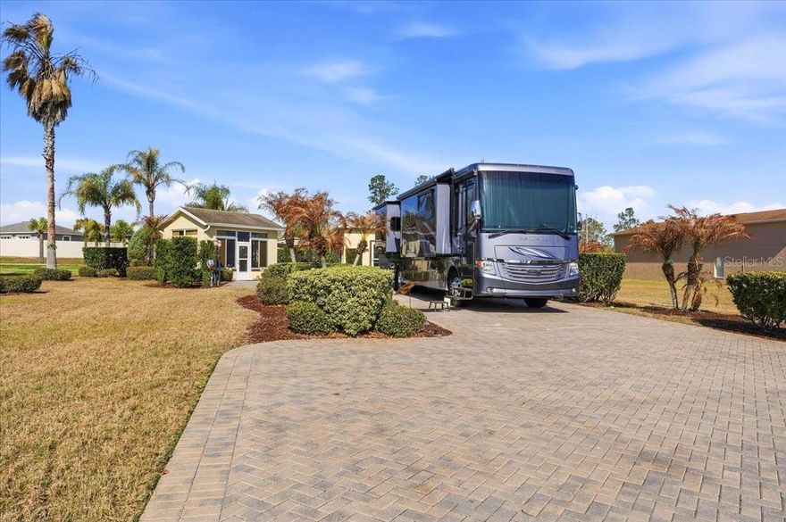Are you dreaming of escaping the winter chill and basking in the Florida sunshine? Imagine yourself in the heart of Mt. Olive Shores North, a premier upscale RV resort, where luxury and relaxation meet. We have the perfect property for your winter getaway, and it's waiting for you!

This isn't just a property; it's an opportunity to create your ideal winter haven. Picture this: two separate casitas, each offering its own unique charm and functionality. The first is a fully equipped retreat, boasting a comfortable living area, a full kitchen for preparing delicious meals, a private bath, and the convenience of a washer/dryer.

But the possibilities don't stop there! The second casita/Florida room is a blank canvas, ready to be transformed into whatever your heart desires. A home office for staying connected? A workshop for pursuing your hobbies? A she-shed for ultimate relaxation? Or perhaps a beautiful Florida room with additional living space and ample windows flooding the space with natural light and offering stunning views of the vibrant landscaping, inspiration will come easily.

Imagine spending quiet afternoons and evenings relaxing in the gentle breeze, surrounded by lush greenery. And with brand new AC systems installed in both casitas this year (2025), you'll always be comfortable, no matter the weather.

The thoughtful design extends beyond the casitas themselves. A beautifully paved area between the buildings is plumbed for an outdoor kitchen, perfect for entertaining and enjoying the balmy Florida evenings. And with plenty of space for creating your ideal outdoor sitting area, you'll be able to fully embrace the beautiful winter temperatures. A remote-controlled, weather-censored irrigation system ensures your property remains lush and vibrant year-round, with minimal effort on your part.

But the appeal of this property goes beyond its individual features. Mt. Olive Shores North offers a vibrant community with two clubhouses, each boasting a sparkling pool and a calendar full of social activities. Whether you're looking to stay active or simply relax and unwind, you'll find everything you need right at your doorstep.

Don't miss out on this incredible opportunity to own a piece of paradise in Mt. Olive Shores North. This property is meticulously designed for efficiency, comfort, and enjoyment. Call today to schedule an appointment to see it for yourself. We promise, it won't last long!