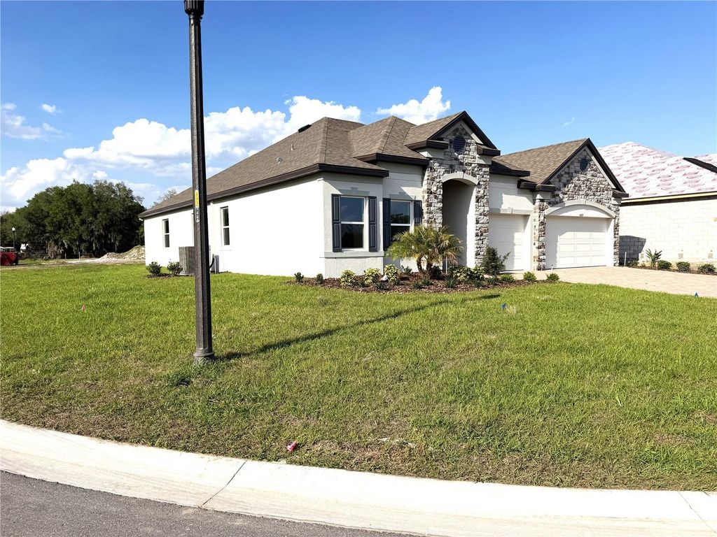 Photo of 4069 Maggie Loop, Lakeland, FL 33813 (MLS # O6395820)