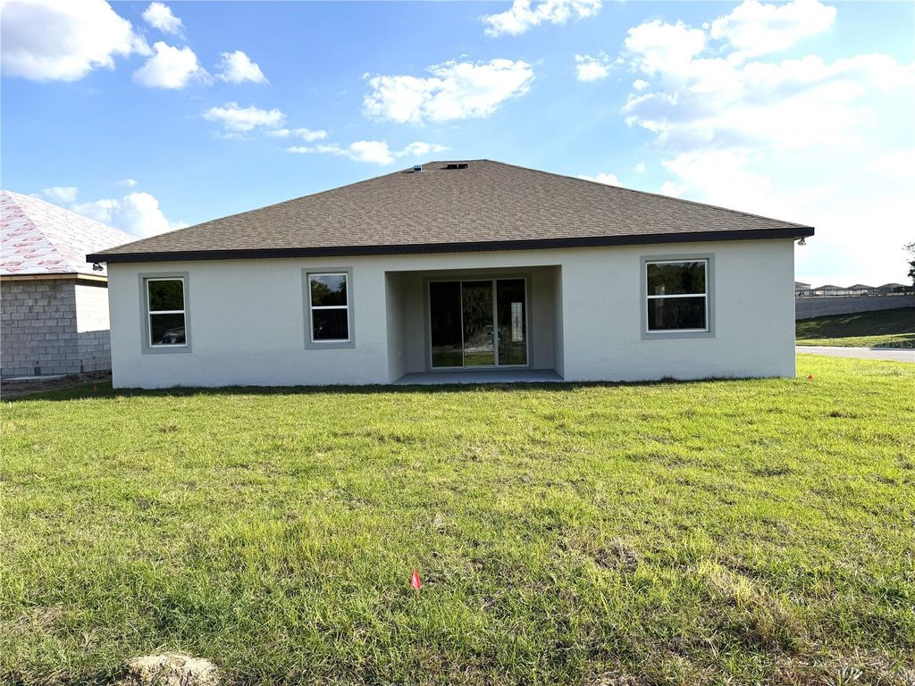 Photo of 4069 Maggie Loop, Lakeland, FL 33813 (MLS # O6395820)