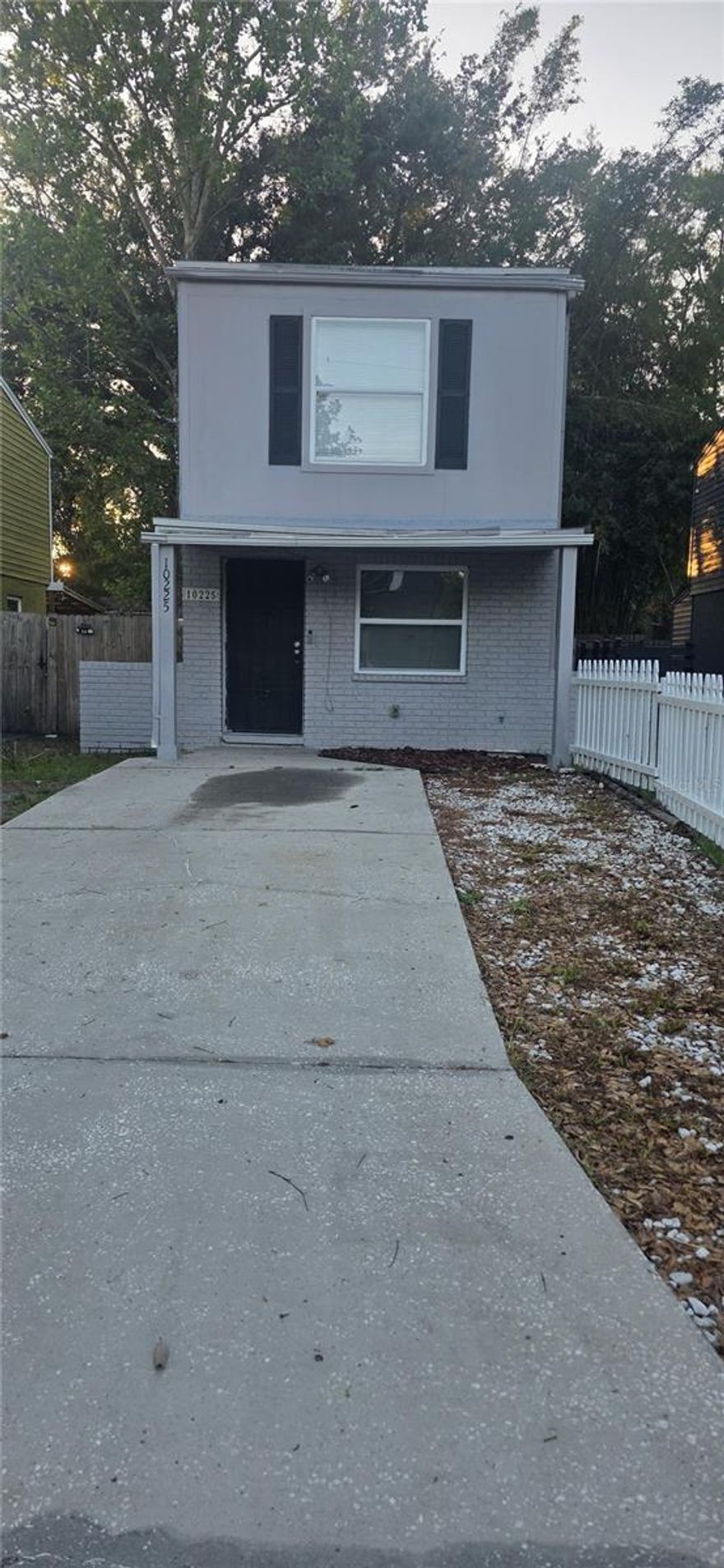 Move-in ready and freshly painted, this charming two-story home offers flexible living space, modern updates, and an unbeatable Tampa location. Featuring 2 bedrooms, 2 full bathrooms, and a versatile bonus room, this home is perfect for a variety of lifestyles. Step inside to discover a fresh interior with new paint and ceramic tile flooring throughout the first floor, creating a clean and modern feel.
The first floor features an open living area, a bonus room that can easily serve as a third bedroom, home office, or flex space, a full bathroom, kitchenette setup, and a convenient laundry closet.

Upstairs, you’ll find two spacious bedrooms, including a primary bedroom with a walk-in closet, along with a second full bathroom.
Outside, enjoy a fully fenced backyard offering privacy and plenty of space for entertaining, pets, or relaxing outdoors.
Located just minutes from Busch Gardens, Adventure Island, and the University of South Florida, with easy access to shopping, dining, and everyday conveniences.

Well maintained and thoughtfully designed with flexible living options, this home is a great opportunity for homeowners or investors alike.
Schedule your private showing today for more details. Owner will also consider a 12 month lease option. Property is offered for Sale or Lease whichever occurs first.