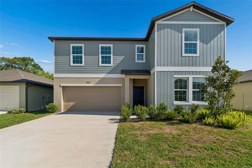 NEVER LIVED IN—FORMER MODEL HOME, built in 2024, and situated on a CONSERVATION HOMESITE within the Angeline community, this TRENTON floorplan offers 6 BEDROOMS, 3 FULL BATHS, and a spacious, flexible design. The first floor features LIGHT-TONED WOOD-LOOK TILE FLOORING throughout the main living areas, a PRIVATE PRIMARY SUITE with DUAL-SINK VANITY, WALK-IN SHOWER, and LARGE WALK-IN CLOSET, along with an ADDITIONAL BEDROOM AND FULL BATH, a dining or flex space off the foyer, a laundry room, and a SPACIOUS KITCHEN with QUARTZ COUNTERTOPS, LARGE CENTER ISLAND, STAINLESS STEEL APPLIANCES, and UPDATED LIGHT FIXTURES, all opening to the GREAT ROOM and DINING AREA with SLIDER ACCESS to the COVERED LANAI overlooking PEACEFUL POND AND CONSERVATION VIEWS. The second floor includes a GENEROUS LOFT/BONUS ROOM, four bedrooms and a FULL BATH, providing ample space for guests, work, or play. Throughout the home, you will find CUSTOM WALL TREATMENTS, DECORATIVE ACCENT WALLS, CEILING FANS, and COHESIVE DESIGN FINISHES that reflect its model home quality. Angeline residents enjoy access to SCENIC TRAILS, OPEN GREEN SPACE, and a forward-thinking community design focused on wellness, connectivity, and future growth, all conveniently located near major roadways, shopping, dining, and medical facilities.