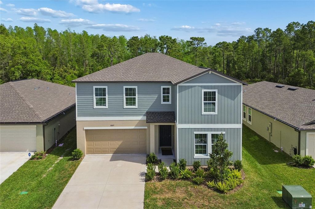 Photo of 10065 Gentle Rain Drive, Land O Lakes, FL 34638 (MLS # TB8492658)