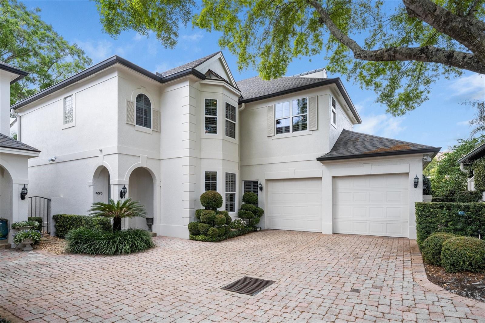 Welcome to 455 N Interlachen in Winter Park, Florida 32789, where timeless elegance meets modern comfort. This stunning home underwent a complete remodel in 2009, ensuring every detail is curated to perfection. As you step inside, you're greeted by a grand foyer that sets the tone for the luxurious living spaces beyond. The main level boasts a harmonious flow between the living room, dining area, and kitchen, creating an inviting atmosphere for gatherings and relaxation. The chef-inspired kitchen is a true masterpiece, featuring top-of-the-line appliances, custom cabinetry, and an expansive island perfect for culinary adventures or casual dining. With high-end finishes and thoughtful design elements, this kitchen is as beautiful as it is functional. A highlight of the home is the primary suite conveniently located on the first floor. Offering a peaceful retreat from the hustle and bustle of everyday life, the primary suite features a spa-like ensuite bathroom and ample closet space, providing the ultimate in relaxation and privacy. Upstairs, you'll find additional bedrooms, each offering comfort and style, making them perfect for family members, guests, or a home office. Every room is bathed in natural light, creating an inviting atmosphere throughout. Outside, the meticulously landscaped yard offers a private oasis for outdoor enjoyment. Whether you're hosting a barbecue with friends or simply unwinding after a long day, the outdoor space provides endless opportunities for relaxation and entertainment. Located in the desirable downtown Winter Park area, this home offers easy access to shopping, dining, parks, and more, allowing you to experience the best of urban living. Don't miss your chance to make this exquisite property your own and enjoy the epitome of Florida luxury living.