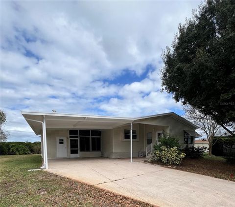 Photo of 6236 Knotty Pine Drive SE, Winter Haven, FL 33884 (MLS # L4957604)