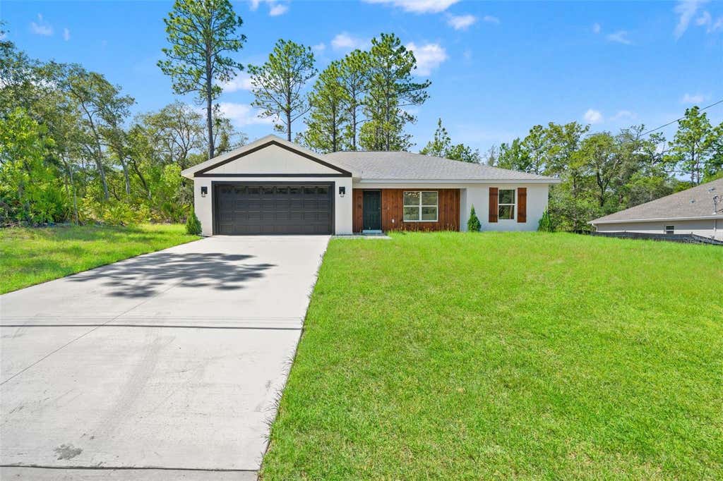 Photo of 2784 W Paragon Ln, Citrus Springs, FL 34433 (MLS # OM727489)