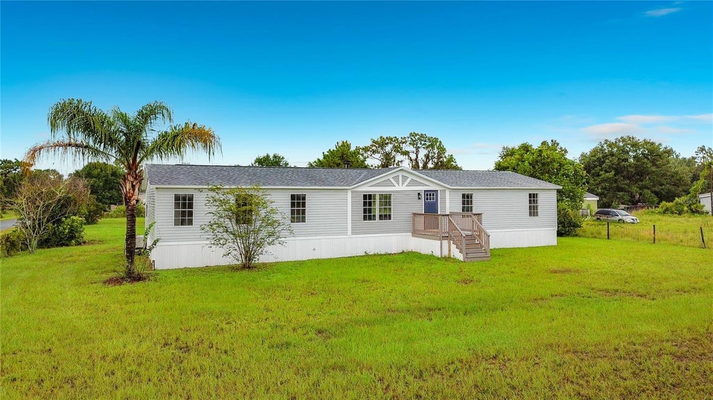 Photo of 9200 Mercury Drive, Saint Cloud, FL 34773 (MLS # O6430260)