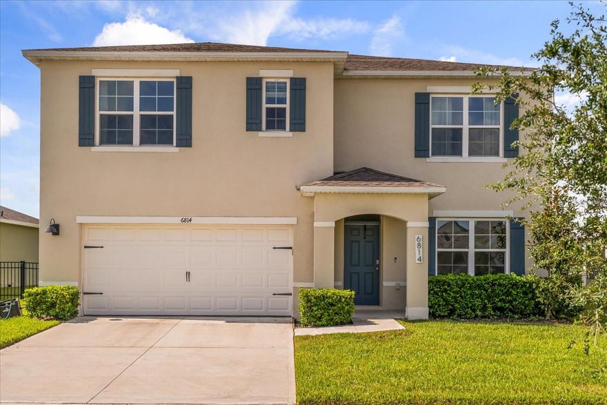 LAKE VIEW and an oversized lot make this stunning two-story Hayden model in the desirable Harmony West community truly special. Built in 2022 and only 3 years old, this home offers the perfect combination of space, functionality, and resort-style living. Enjoy 5 spacious bedrooms and 3 full bathrooms, including a first-floor guest suite with full bath ideal for multigenerational living or visiting guests. The open-concept kitchen features a large island, breakfast bar, and stainless steel appliances, seamlessly flowing into the bright living and dining areas for effortless entertaining and everyday comfort. Upstairs, the expansive primary suite boasts two walk-in closets and dual vanities, while the versatile loft provides the perfect space for a media room, home office, or play area. Step outside to a massive backyard overlooking the lake, offering endless possibilities to relax, entertain, or create your dream outdoor oasis. Harmony West delivers a true resort-style lifestyle, featuring a 5,000 sq ft pool with sun shelf and splash pad, a clubhouse with chef’s kitchen and lounge, fitness center, dog parks, playgrounds, walking/biking/equestrian trails, and a scenic amphitheater for community events. Conveniently located just minutes from Lake Nona, Medical City, US-192, and Florida’s Turnpike, with easy access to Orlando, beaches, shopping, and dining, plus the Johnny Miller Signature Harmony Golf Preserve. Zoned for top-rated Osceola County schools, this home truly checks all the boxes. This is the lake-view home you’ve been waiting for—schedule your showing today!