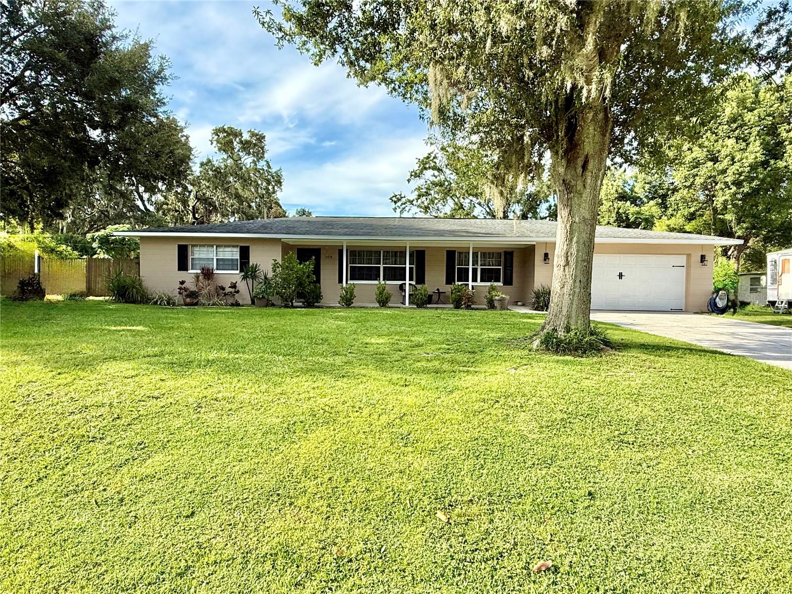 Welcome to this beautifully renovated 3 bedroom, 3 bath pool home in the highly desirable Gibson Park neighborhood. With NO HOA or CDD
this property offers the freedom and convenience you're looking for. Step inside to find a move-in ready home featuring fresh paint, newer flooring, wood cabinets, granite countertops and a brand new stainless steel refrigerator, dishwasher and water heater. The roof was replaced in 2019 for added peace of mind. The spacious layout includes a very large family room with fireplace and double sliding glass doors that open to a gorgeous screened in big, inground pool. Perfect for entertaining, the pool area includes a full bath with a shower that doubles as a dog wash. Additional highlights include an attached 2 car garage with a laundry room, privacy fenced back yard and a location close to shopping, restaurants and highway access. Don't miss your chance to own this incredible home-schedule your private showing today!