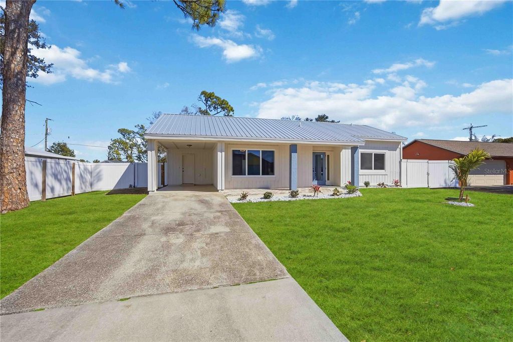 Photo of 1302 Eagle Street, Port Charlotte, FL 33952 (MLS # N6143142)