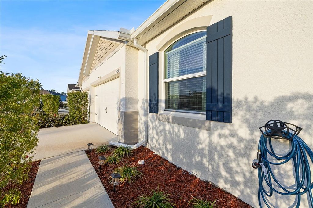 Photo of 8498 Bold Cypress Lane, Wesley Chapel, FL 33545 (MLS # TB8477086)