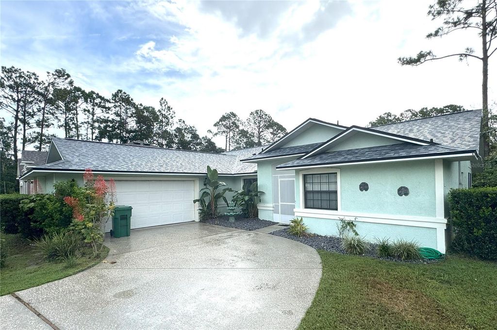 Photo of 64 Bruning Lane, Palm Coast, FL 32137 (MLS # FC312210)