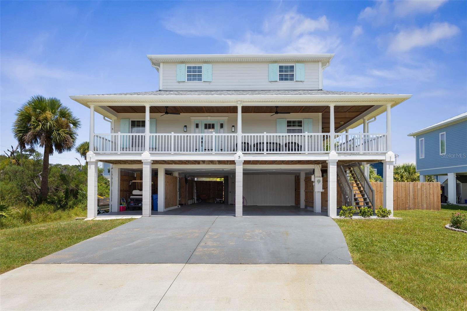 Walk to the Beach – Stunning Coastal Home in The Hammock
Rich with coastal charm, this home captures the essence of Old Florida living in the Hammock—where ocean breezes flow through multiple sun-drenched decks, and every space invites you to relax, unwind, and soak in the laid-back beach lifestyle. This warm and inviting 3-bedroom, 2.5-bath elevated home features a 4th flex room currently used as a guest room and office. With 2,098 sq ft of living space, it’s perfect as a full-time residence, vacation getaway, or investment property. Since 2021, the major systems—including roof, HVAC, and water heater—have been replaced, along with new flooring, a whole-house water softener, and many other updates and upgrades. The gorgeous new kitchen boasts custom cabinetry, stainless steel appliances, and quartz countertops. The main level includes the primary suite with walk-in closet and updated bath, living and dining rooms, screened balcony, and the versatile 4th room. Upstairs offers a family room/den with office space, two bedrooms, a full bath, and a sun deck. Elevated design provides abundant parking, a covered golf cart alcove, large workshop/storage room, and fenced yard. Perfectly situated just 20 minutes from historic St. Augustine, central between Jacksonville and Orlando, and close to all that Palm Coast and Flagler Beach have to offer, this home also puts the Daytona airport just 30 minutes away—making quick getaways a breeze. A location this convenient, paired with the timeless beauty of the Hammock, is truly hard to find.