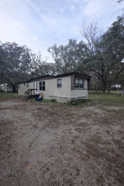 Photo of 205 Little Star Road, Hawthorne, FL 32640 (MLS # OM716445)