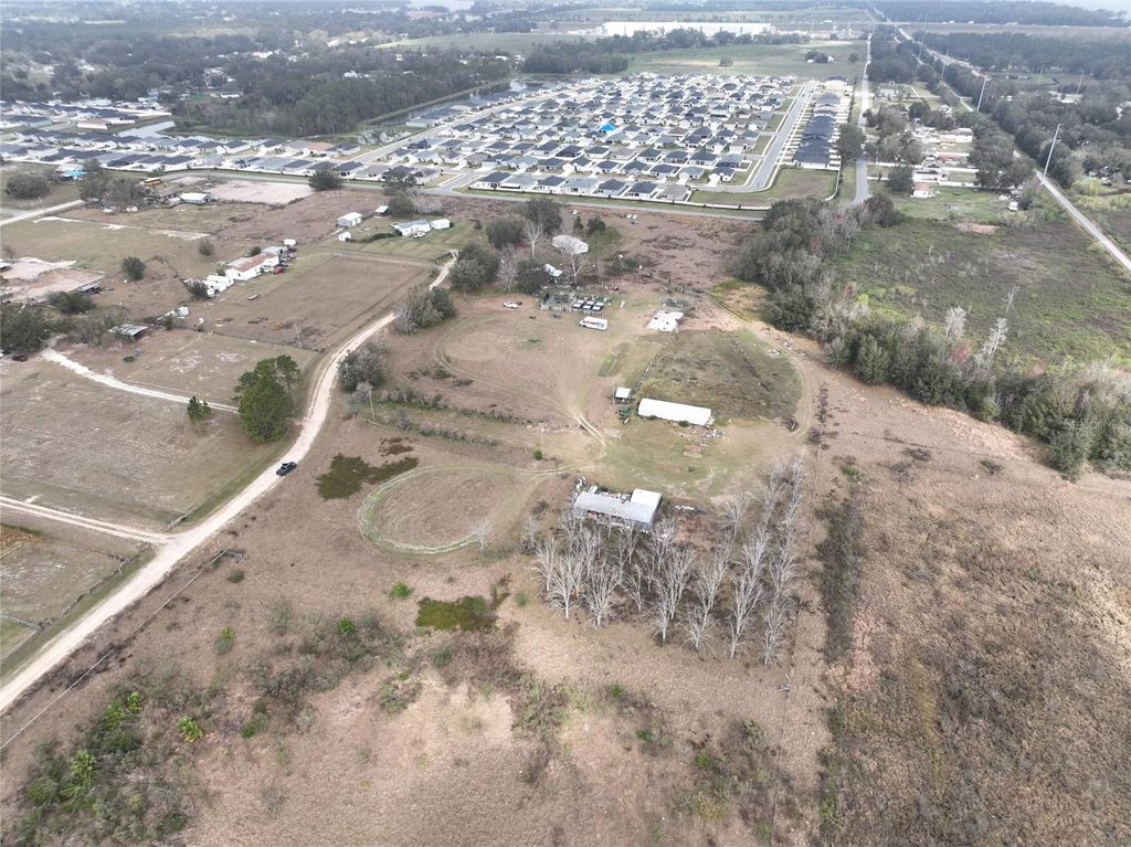 Photo of 307 Skyblue Lane, Auburndale, FL 33823 (MLS # O6365247)