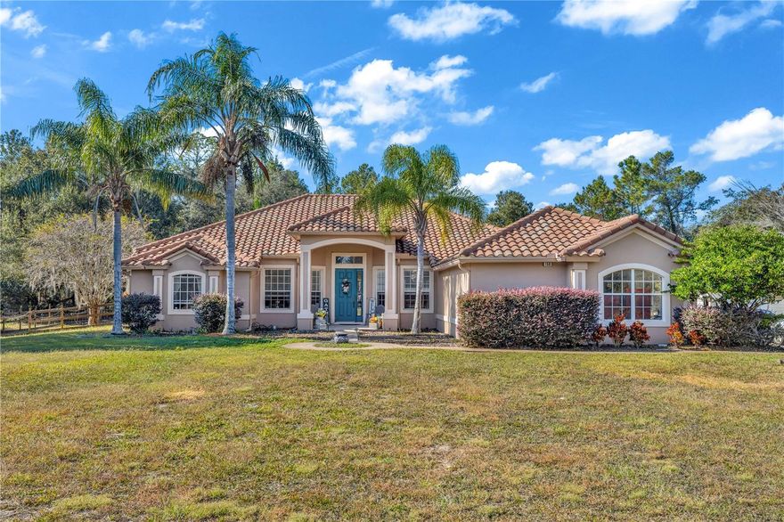 Stunning 4-Bedroom Home with Office on 2.5 Acres – Perfect for Country Living and Entertaining.

Welcome to this beautiful 4-bedroom, 3-bathroom estate that perfectly blends luxury and country charm. Situated on 2.5 acres, this home offers room to breathe, play, and entertain—plus it’s zoned for horses, chickens, and goats!

Step inside to find brand new hickory wood flooring throughout and a spacious open layout. The gourmet kitchen is a chef’s dream, featuring premium appliances and plenty of space to gather. The adjacent family and dining areas flow effortlessly, creating the ideal setting for everyday living and special occasions.

The massive primary suite is your private retreat, complete with a separate sitting area, two walk-in closets, and a spa-inspired bathroom with a walk-in shower. Each of the additional bedrooms is generously sized, offering comfort and versatility for family or guests.

You’ll also love the dedicated office, perfect for working from home, and the laundry room that comes equipped with a washer and dryer for convenience.

Step outside to your fenced backyard oasis featuring a summer kitchen with a built-in grill, refrigerator, and sink—perfect for entertaining under the stars. A three-car garage provides ample storage and parking.

With a tile roof, beautiful craftsmanship throughout, and plenty of space for both indoor luxury and outdoor adventure, this property truly has it all.