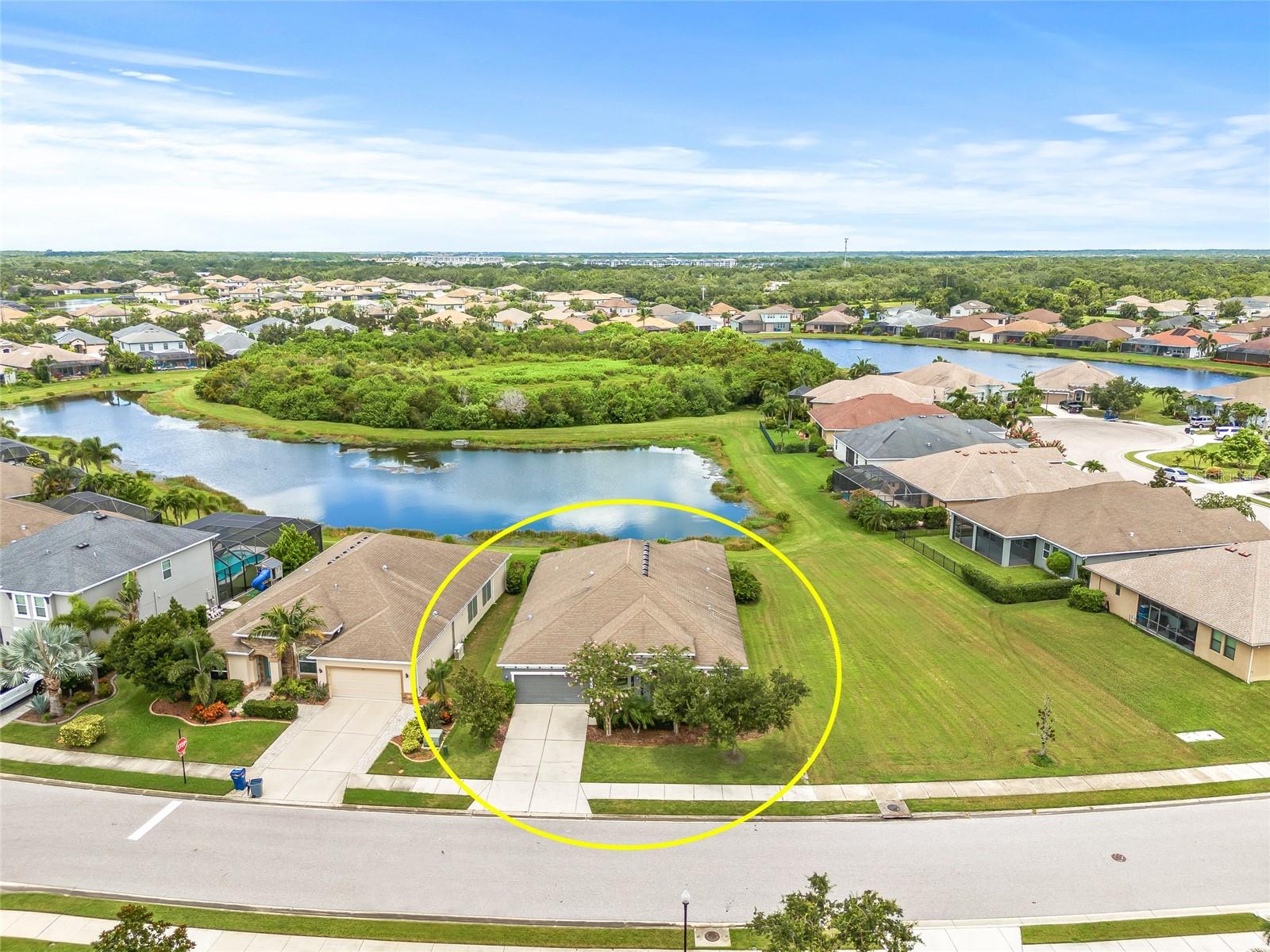 Welcome to this beautifully designed five-bedroom "Inverness" floor plan, located in the highly sought-after gated community of Greyhawk Landing. Energy Star qualified for efficiency and comfort, this home offers thoughtful design and spacious living throughout. Just off the foyer, the formal living room sets the tone with warmth and style. The heart of the home is a stunning kitchen featuring 42" maple espresso cabinets with crown molding, a tile backsplash, granite countertops, and stainless steel appliances—including a gas range. A generous island with an undermount stainless sink opens to the family room, making it perfect for entertaining. Adjacent to the kitchen, you'll find a charming breakfast nook and a formal dining room with a tray ceiling. The family room features a tray ceiling and recessed lighting, creating an inviting space to gather. The master suite is a true retreat, complete with a tray ceiling, walk-in closet, sliding glass doors that lead to a covered lanai, and a luxurious en-suite bath with double sinks, upgraded tile, granite countertops, and a brushed nickel shower enclosure. Bedrooms 2 and 3 are tucked at the front of the home and share a stylish hall bath, while bedrooms 4 and 5 enjoy the convenience of a shared Jack & Jill bathroom—each bath featuring granite countertops. Stone accents on the exterior add a beautiful finishing touch. As a resident of Greyhawk Landing, you’ll enjoy resort-style amenities such as pools, a fitness center, tennis and pickleball courts, sports fields, clubhouse events, and miles of scenic walking and biking trails—all for an incredibly low HOA fee of just $70 per year. Homes like this don’t come around often. Schedule your private tour today and experience everything this exceptional property has to offer!