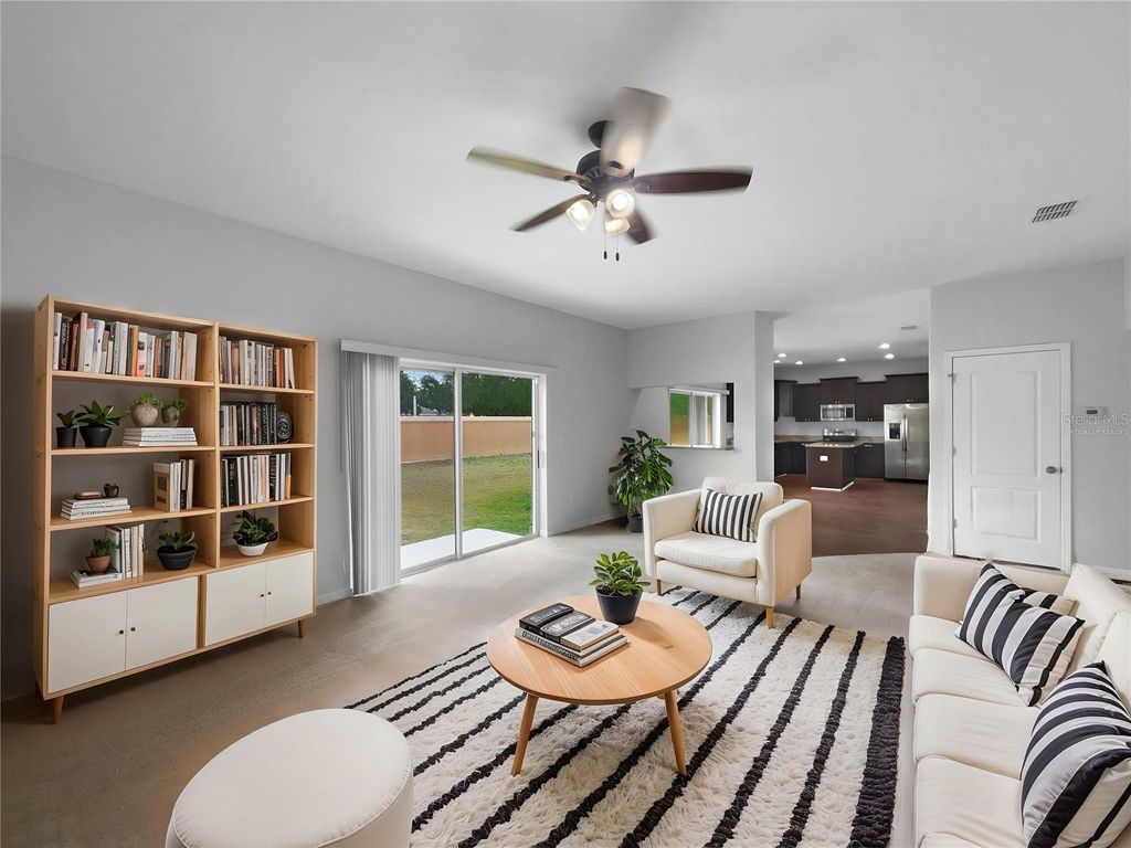 Photo of 10768 Carloway Hills Drive, Wimauma, FL 33598 (MLS # O6308911)