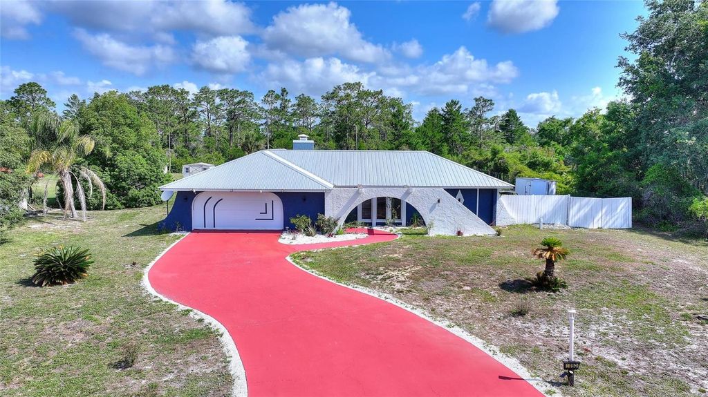 Photo of 3850 Park Avenue, Indian Lake Estates, FL 33855 (MLS # P4938576)