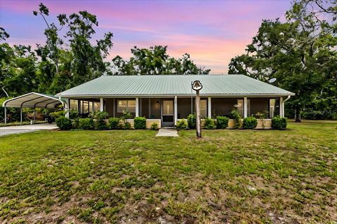 Photo of 303 NE 290th Avenue, Old Town, FL 32680 (MLS # GC532292)