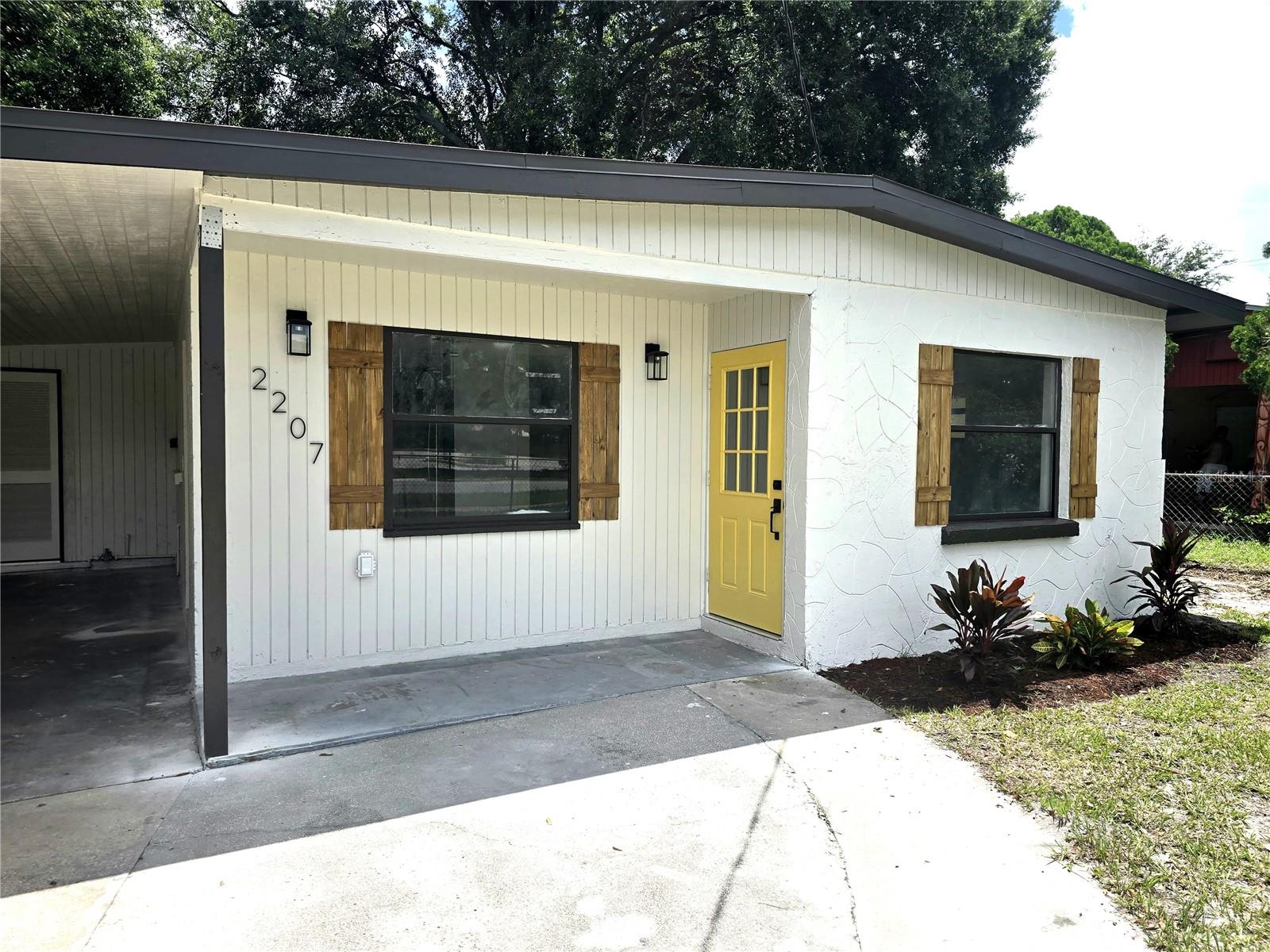 Welcome to this fully remodeled gem in the heart of Lakeland! Best of all? No HOA. No CDD. Better than New. MORE PICS SOON
This solid block home has been completely transformed with high-end finishes and is truly move-in ready. Featuring brand new waterproof laminate flooring throughout, a brand-new roof, and a newly installed central AC and heating system with all-new ductwork—say goodbye to window units!
The gorgeous kitchen offers designer cabinetry, elegant countertops, and stainless steel appliances. Both bathrooms have been fully updated with a modern touch, combining comfort and style.
Sitting on a nearly 1/4-acre lot, fully cleared and boasting a brand-new landscaped yard, this home is perfect for outdoor living. Plus, enjoy the convenience of a covered carport.
This home truly checks all the boxes—style, space, and peace of mind. Schedule your private tour today!
