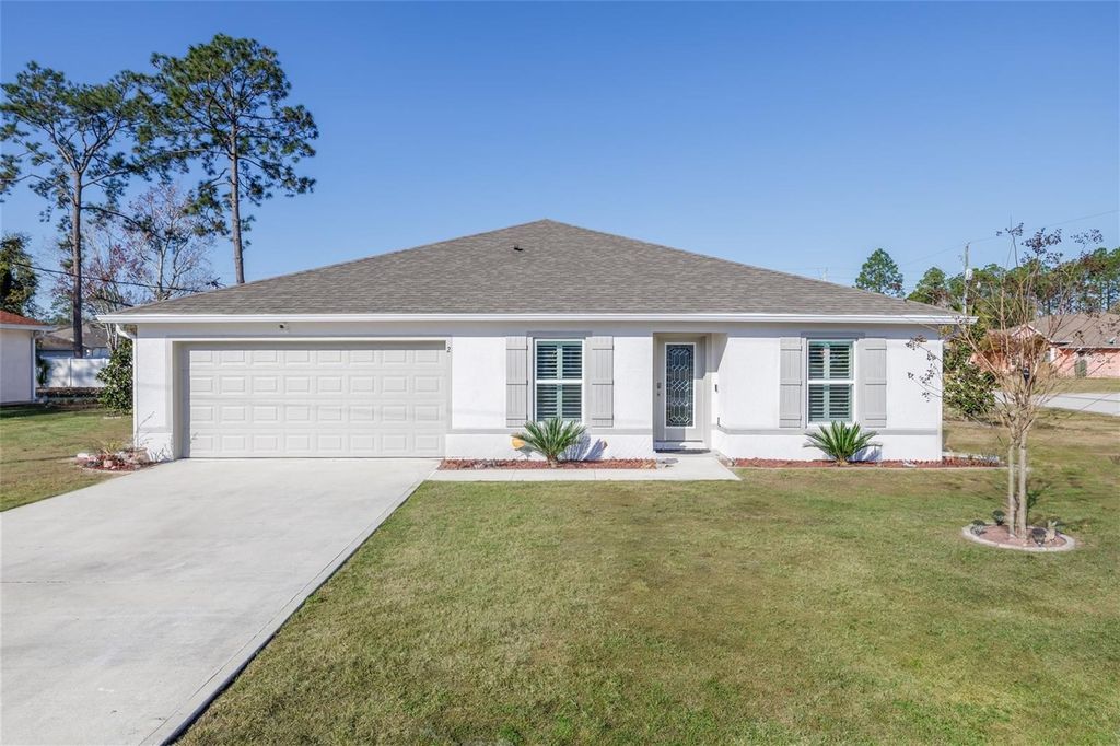 Photo of 2 Rainrock Place, Palm Coast, FL 32164 (MLS # FC316419)
