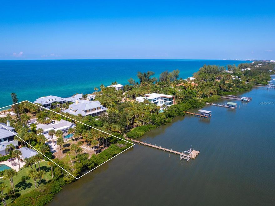 Gulf to Bay on North Casey Key – the perfect location! Panoramic views of Little Sarasota Bay to the east and a beachfront lot on the west. Original cypress tongue and groove ceilings and beautiful oak floors add warmth and nostalgia throughout the home.  A nicely updated kitchen overlooks the pool and bay. The entire second floor is dedicated to an oversized primary suite with a sitting room and study overlooking the beach and bay.   Step outside to the rooftop deck for stargazing at night or a dip in the swimming pool.  The split floor plan also provides two generously sized bedrooms off the living area with a shared bath between. Add a dock on the bay for boating, kayak and paddleboarding or bring a towel and sunscreen for an afternoon on your own private beach. What’s not to love? The bayside cottage provides everything one could need.  Enjoy this lovingly cared for 3 bedroom, 2 bath home for the near term and realize the full potential of 2 separate building lots in the future. Just 5 minutes from restaurants, Publix, CVS, 10 minutes to the City of Venice and 15 minutes to Sarasota.  Commercial and private air travel is readily available nearby. Come see why those that are lucky enough to call Casey Key home, are lucky indeed!