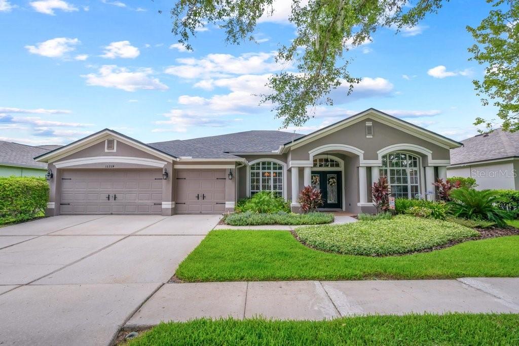 GORGEOUS HOME & LOCATION...EVERYONE LOVES THE 'GRAND FLORIDIAN'! Nestled on a deep conservation cul-de-sac lot, this sprawling 3,043 sq. ft. one-story home is sure to impress! Prepare yourself, a picturesque backdrop will capture your attention as soon as you open the front door...Fall in love with Suarez’s sought-after “Grand Floridian” model featuring a versatile 3-way split floor plan offering 5 bedrooms (or 4 plus a dedicated office with a closet), a spacious bonus room (possible MIL Suite) , 3 full bathrooms, and a 3-car garage. The extended master suite is truly a retreat, complete with a jetted garden tub and generous space to relax. Upgraded throughout with luxury vinyl plank flooring, granite countertops, stainless steel appliances, crown molding, a cozy fireplace, and smart home features including Nest thermostats, B-Hyve irrigation, and Nest doorbell. Major updates include a new roof (2019) and two new A/C units (2022). The freshly painted interior showcases neutral tones throughout, and the fenced backyard opens to a tranquil pond and lush conservation area—no backyard neighbors! Enjoy outdoor living on the oversized screened lanai, perfect for entertaining. Located in the heart of FishHawk Ranch, within the FishHawk Creek Elementary zone, and just steps away from top-rated schools, resort-style amenities, four community pools, fitness centers, sports complex, Park Square, and scenic trails. With easy access to shopping, dining, MacDill AFB, downtown Tampa, and Florida’s best beaches, this is Home Sweet Home you won’t want to miss. Schedule your private showing today!