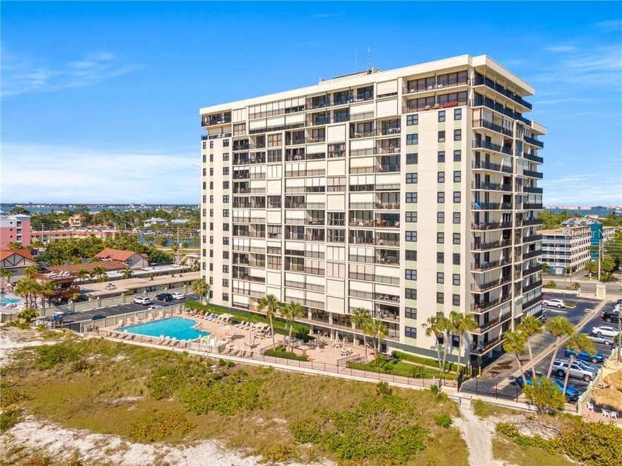 Wow! Gorgeous condo on the eighth floor of popular San Seair AVAILABLE NOW for 2026 Off Season Lease thru the end of October (Minimum of three months). The property is located right on St Pete Beach, often recognized as the #1 Beach in the US. Enjoy panoramic views of the Gulf with its stunning sunsets and also of the Intracoastal Waterway, Boca Ciega Bay and trendy downtown St. Pete. This condo has a spacious open floorplan with dramatic floor-to-ceiling windows in the Great Room and four sets of sliding glass doors, making the unit bright and sunny. The condo has just been beautifully refurbished with all new furniture, a gorgeous new Kitchen with new stainless appliances, new kitchenware and linens almost brand new. The two-bedroom plan has two spacious bedrooms and two full ensuite Bathrooms. The highly sought-after San Seair Condo has a lot to offer residents and tenants. This is a gated community with a large heated pool overlooking the beach. Enjoy the nice BBQ grill and picnic area, Fitness room, Library, Pool Room, community room, laundry rooms, storage and more. Comes with a convenient Assigned Parking Space. San Seair has just completed a multi-million dollar renovation: new balcony rails, pool deck, new roof, newly paved parking lot and new exterior paint. Located in the heart of St Pete Beach very close to a variety of quaint restaurants and shops and only 15 minutes from trendy Downtown St Pete. Fees include: $65 application fee per adult, tenant processing fee $100, cleaning fee $250. Florida required taxes of 13% for rentals less than 6 months +1 day apply. Rent includes water, sewer, trash pickup, basic cable tv and internet, recreation, parking and management. Sorry no pets.