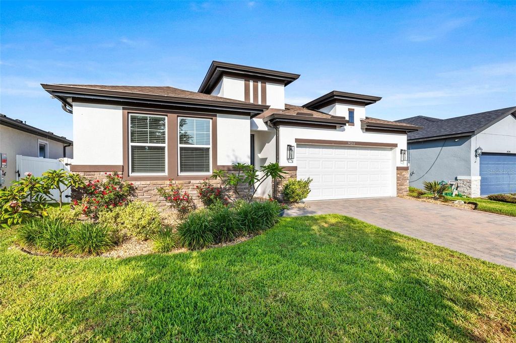 Photo of 34266 Radley Way, Wesley Chapel, FL 33545 (MLS # TB8383039)