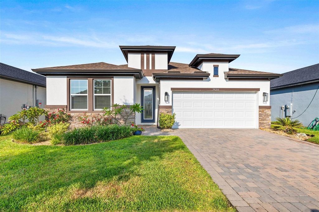 Photo of 34266 Radley Way, Wesley Chapel, FL 33545 (MLS # TB8383039)