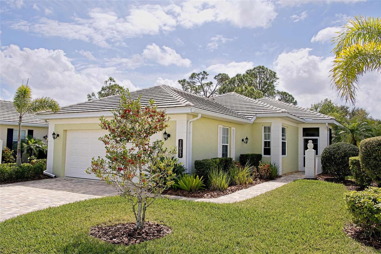 PRICED TO SELL! WORRY-FREE LIVING WITH PREMIUM PERKS! THE FEES INCLUDE EXTERIOR INSURANCE (DRYWALL OUT), WIND COVERAGE, ROOF RESERVES, EXTERIOR PAINTING, LAWN CARE, PEST CONTROL, TERMITE PREVENTION, HIGH-SPEED INTERNET, TWO POOLS, A RESIDENT-RUN CLUBHOUSE, AND FULL COMMUNITY MANAGEMENT—EVERYTHING YOU NEED FOR A TRULY MAINTENANCE-FREE LIFESTYLE!
This free-standing, maintenance-free villa in St. Andrews East at The Plantation Golf & Country Club offers the perfect combination of elegance, privacy, and Florida’s carefree lifestyle. Featuring three bedrooms, two and a half baths, and an open, airy layout, this home is designed for both relaxation and entertaining. The home is offered Turnkey Furnished with some exceptions.
The kitchen is a chef’s dream, with custom creamy white cabinets, stainless steel appliances, double ovens, a cooktop with a hood vented to the outside, and an oversized walk-in pantry. A cozy dining nook tucked into a bay window allows you to enjoy your morning coffee bathed in natural sunlight. The primary suite is a luxurious retreat with dual walk-in closets, double sinks, a spacious Roman walk-in shower, and private access to the lanai. One guest room includes an ensuite bath and a large walk-in closet, while the third bedroom, currently used as a den, offers flexible living space to suit your needs.
The home’s color palette of soft whites and blues, combined with its modern coastal decor, creates a serene and inviting atmosphere. The living room’s tray ceiling adds a touch of elegance, and the natural light throughout enhances the home’s open and airy feel. Outside, the heavily landscaped backyard provides complete privacy, transforming the lanai into a tranquil escape. With a large covered area, it’s the ideal spot for reading a book, enjoying an afternoon nap, or hosting friends.
Built with quality construction, this home offers peace of mind with impact hurricane glass windows and shutters for the sliding glass doors, making it storm-ready in minutes. As a condominium property, everything from the drywall out is covered, including structural insurance, roof reserves, exterior maintenance, landscaping, and even internet. It’s a perfect choice for travelers or anyone seeking a truly maintenance-free lifestyle.
The St. Andrews East neighborhood features an active clubhouse, two community pools, and all the benefits of living within The Plantation Golf & Country Club. This master-planned community boasts two 18-hole championship golf courses, 13 Har-Tru tennis courts, six pickleball courts, bocce ball, a fitness center, a Jr. Olympic pool, and exceptional dining and activity programs. Membership is optional, so you can choose the level of involvement that suits you best.
Conveniently located just minutes from the Gulf beaches, fine dining, shopping, the vibrant Wellen Park Downtown, the new Atlanta Braves Stadium, and easy access to I-75, this villa is a rare find. Schedule your private showing today and experience the best of Florida living!