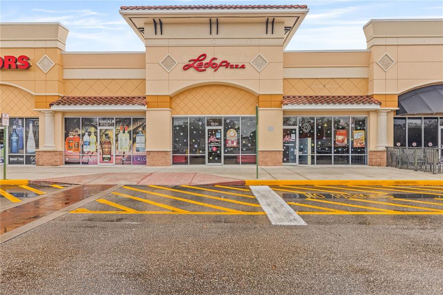 Second-generation restaurant space available — bring your own concept. Formerly home to Michaelangelo’s Pizza and most recently Ledo’s Pizza, this prime restaurant opportunity is located in a high-traffic Publix-anchored shopping center in North Port.
The space was fully renovated in 2025 and is completely built out for restaurant use, allowing for a smooth and efficient transition for a new owner. The dining area currently seats approximately 80 guests with room to expand and includes a small bar area that enhances the guest experience.The restaurant currently holds a beer and wine license, with the potential to pursue a full liquor license, creating additional opportunity for future growth. The kitchen is equipped with a walk-in refrigerator and walk-in freezer to support efficient operations, and the space also includes a dedicated office for management and day-to-day management needs.
This is an excellent opportunity for a new owner to introduce their own concept in a well-established, high-visibility location along the main North Port corridor. With the major build-out already complete, everything is in place to bring a new restaurant vision to life.