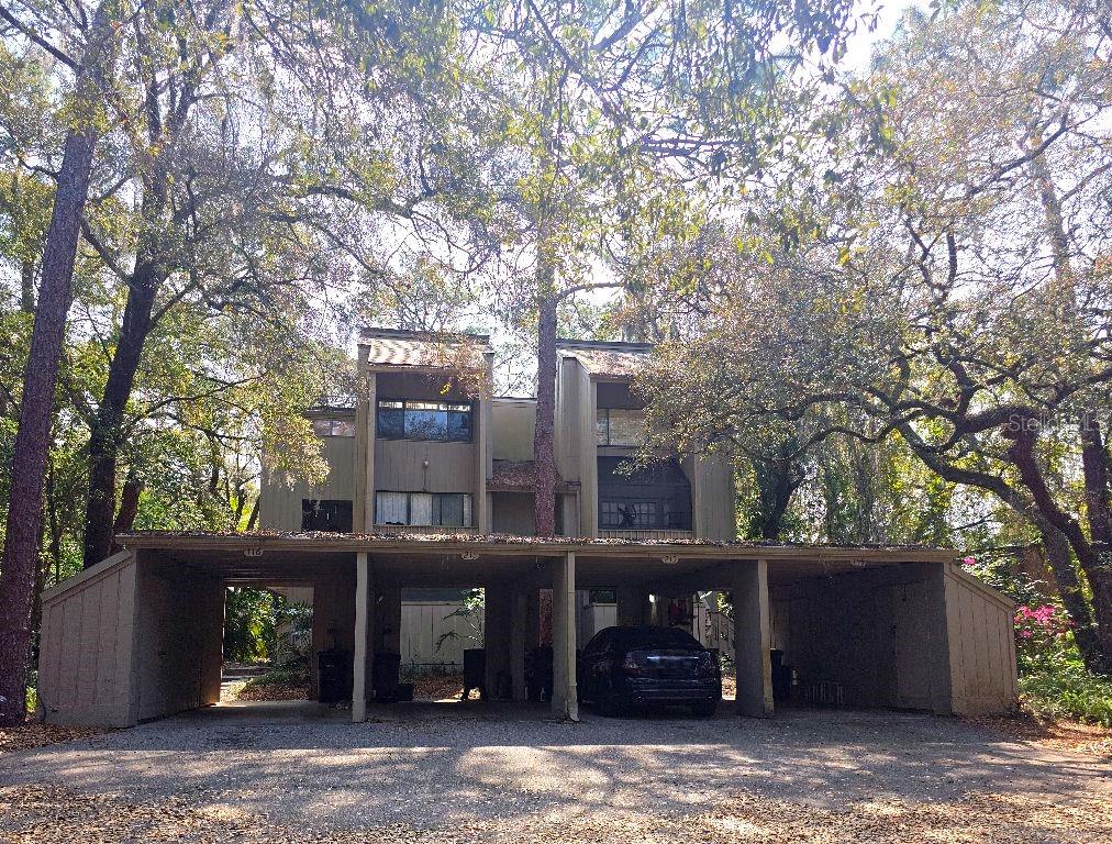 Welcome to your paradise located in the lush,nature filled community of The Springs! This ground level condo and community has so much to offer! The floor plan offers a great use of space with an open kitchen, good sized bedroom and bathroom and an extended living/dining area. Features include Granite countertops, solid wood cabinets, bamboo wood floors in the kitchen and bedroom, a gorgeous copper kitchen sink, brand new luxury vinyl plank flooring in bathroom and living area, newer Master shower, water heater, HVAC, and electrical panel, as well as fresh interior paint. Lots of extra storage in the carport and front patio and the All in one washer/dryer is even included! The master bedroom offers it's own private courtyard. Step outside and enjoy an extended patio with TREX® flooring overlooking lush plants and a serene atmosphere. You will feel like you are tucked away somewhere in the woods, but you are just minutes to everything you could ask for. The Springs community offers a 24 hour manned security gate, a clubhouse for activities surrounded by a beautifully treed area with benches; enjoy the Tennis court, Basketball court, or try your hand at pickleball! There are two pools as well as the natural spring that stays cool all year round, and plenty of walking trails to enjoy!! There are fun family events that take place in the community every year. The Springs is right around the corner from I-4 for an easy commute. It is centrally located and you will be close to hospitals, restaurants, shopping, UCF, Rollins, Seminole State College and more! Zoned for Seminole County Schools! This is truly a unique neighborhood that you will love to be a part of.....Come check it out!