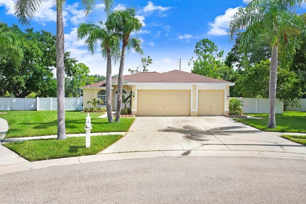 Welcome to this beautifully updated 3-bedroom, 2-bathroom pool home on over 1/4 acre located in the highly sought-after Countryway community, just minutes from Westchase! This stunning property perfectly combines style, comfort, and convenience, making it an exceptional opportunity for anyone seeking the Florida lifestyle. From the moment you arrive, you’ll notice the home’s inviting curb appeal and generous fenced-in lot on a cul-de-sac, offering privacy and plenty of outdoor space for relaxation or play. Step inside and be greeted by an open, light-filled floor plan designed with both function and elegance in mind. Wood-look tile flooring flows throughout the formal areas, while luxury vinyl plank flooring adds warmth and durability to the remaining spaces — creating a cohesive and low-maintenance design. The heart of the home is the fully updated, modern kitchen, featuring sleek cabinetry, stainless steel appliances, granite countertops, and a stylish backsplash. The open layout connects the kitchen to the dining area and spacious living room, making it ideal for entertaining friends and family or enjoying quiet evenings at home. Natural light abounds thanks to large windows and glass doors that overlook the backyard oasis. The split bedroom floor plan offers privacy, with the primary suite tucked away for ultimate comfort. The primary retreat boasts a beautifully updated en-suite bath complete with dual sinks, a walk-in shower, a separate soaking tub, and a walk-in built-in closet, providing both luxury and functionality. Two additional bedrooms share a modern full bathroom, perfect for guests or family members. Step outside to your own private paradise! The screened-in pool and lanai provide the perfect setting for relaxing or hosting gatherings year-round. The expansive fenced yard offers plenty of space for pets, gardening, or outdoor activities, all while enjoying peaceful Florida evenings. This home is not only gorgeous but also situated in an unbeatable location! Countryway is a highly desirable community known for its central location, great schools, and proximity to an array of amenities. Enjoy easy access to Westchase, popular shopping and dining destinations, golf courses, parks, YMCA and recreational facilities. Plus, you’re just a short drive to Downtown Tampa, Tampa International Airport, International Plaza and some of Florida’s most beautiful Gulf Coast beaches. Additional features include: updated modern lighting fixtures, neutral paint throughout, ample storage, and an attached three-car garage. With its prime location, stunning updates, and backyard oasis, this home truly checks all the boxes for modern Florida living. Don’t miss your chance to own this exceptional property in one of Tampa’s most desirable areas. Schedule your private tour today and experience the lifestyle you’ve been dreaming of!