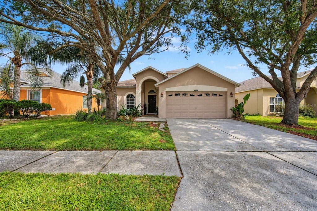 Photo of 10330 Goldenbrook Way, Tampa, FL 33647 (MLS # TB8553670)