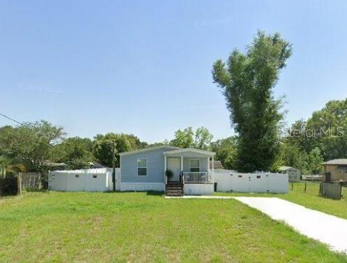 Nearly New Home Near Lake Weir & The Villages – Assumable VA Mortgage! This spacious 3-bedroom, 2-bath home offers the perfect blend of comfort and convenience. Step inside to an inviting open floor plan with a bright living area, a well-appointed kitchen featuring a breakfast bar, pantry, and dining nook. Home has an indoor laundry area for added ease. The primary suite boasts a generous walk-in closet and private ensuite bathroom. The other 2 bedrooms are comfortably sized. The privacy-fenced backyard provides plenty of room to grow your garden, play, or simply relax. Ideally located just minutes from Lake Weir, The Villages, shopping, dining, medical care, and more—this home delivers both lifestyle and value.