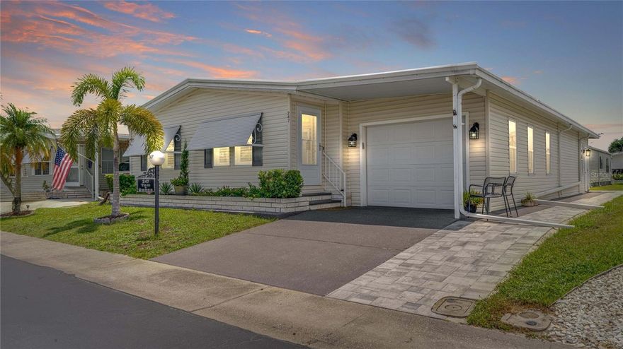 Charming 2-Bedroom, 2-Bath Manufactured, Garage Home in Horizon Village | An Extraordinary & Affordable Dream Home | North Fort Myers, Florida - This spacious manufactured home, boasting approximately 1,900 SF, offers much more than two bedrooms. Bonus and flex space abound and will readily accommodate your lifestyle; your needs and wants, while providing luxury, comfort and style. 

New residents will be taken aback by a stunning 20' x 10' kitchen. The designer LX quartz countertops, stainless appliances, built in lighted cabinetry, and an eat-in breakfast area, make it the perfect spot for casual dining. New light fixtures, and the recently installed Fandelier, reflect the taste and style of the current owners. Two pantries? Of course!

The expansive living room, dining area, and family room are ideal for entertaining or relaxing. There is also ample room for a home office, craft space, or a reading nook; perhaps a den, as both lanai areas are tastefully finished and air-conditioned, providing additional living space to enjoy year-round. The possibilities are endless. The choices are yours.

The 20' x 13' master bedroom is a retreat. The en suite bathroom, as well as the guest bathroom, have been enhanced and updated with Cambria quartz.

Additional Upgrades & Enhancements Include: AMS Roof – 2023 (Transferable Warranty) | AC – 2024 | Hot Water Heater – 2020 | Repiped – 2020 | Fresh Landscaping – 2025 | Brick Paver Golf Cart Pad & Patio - 2025 | Storm Door – 2024 | Bluetooth Garage Door & Springs – 2025 | Inside Laundry - Newer Appliances | Freshly Painted | Finished Decorative Driveway 

Don't miss your chance to own this exceptionally well-maintained home in a warm and welcoming 55+ community rich with amenities. Shares valued at $100K are included in the sale price. HOA Fees - $300 Month. No Flood Zone | No Ground Rent. Schedule your showing today!