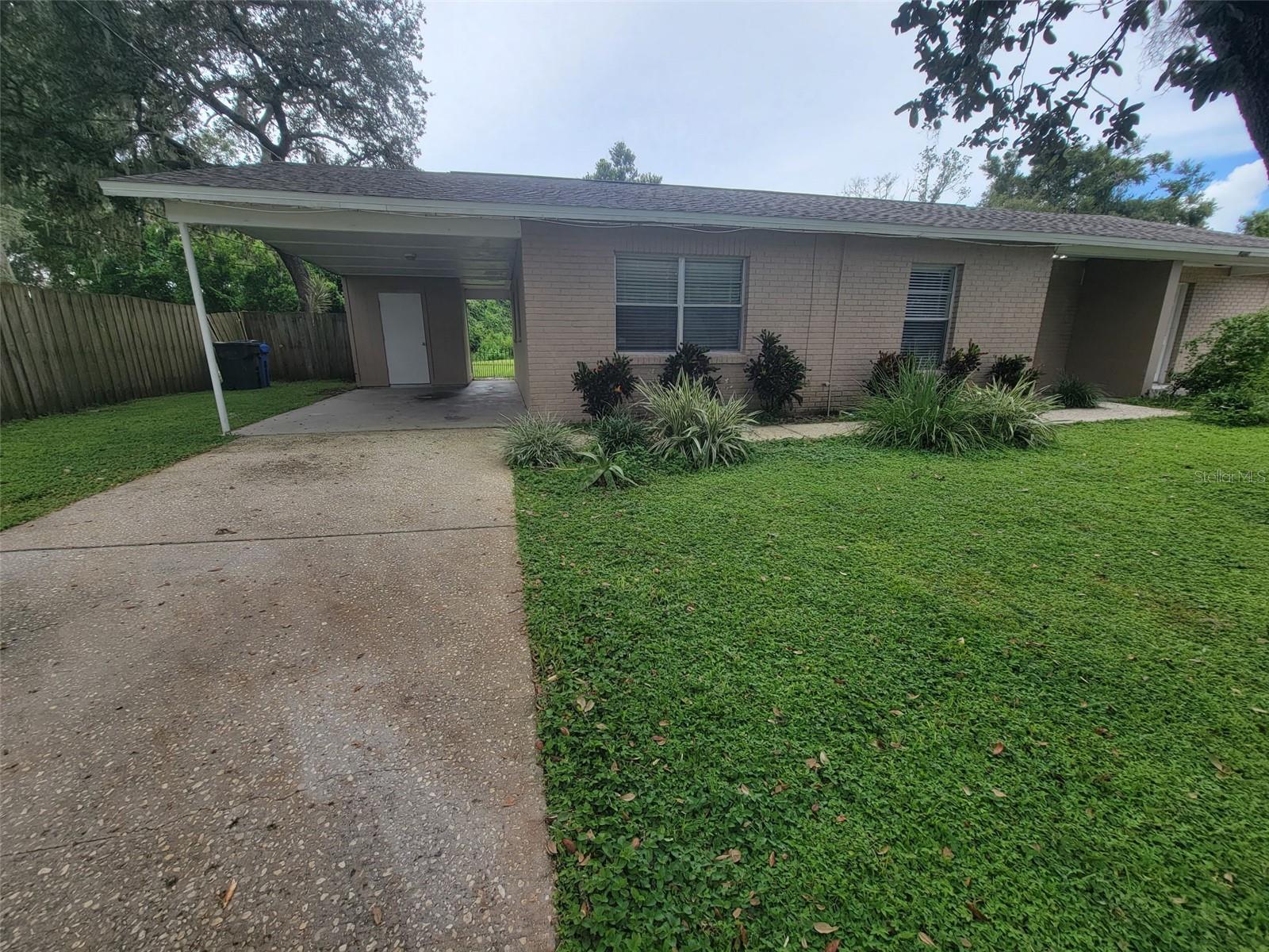 One or more photo(s) has been virtually staged. Brandon - Riverview Area - Priced for immediate move in - Gorgeous Updated 2 bedroom / 1 bath villa with carport on a quiet cul-de-sac street. Your own driveway, carport, and private fenced yard. Remodeled ! ! Wood looking floors and tile NO CARPET, updated kitchen cabinets, updated kitchen GRANITE countertops, under mount sink, updated bathroom vanity, and much more! Newer french door refrigerator and smooth top range. Open floor plan with great room. Private fenced backyard. Your own driveway, carport, outside storage, central heat and air, washer & dryer hookups. Located close to Providence and Bloomingdale near Publix, shopping, dining, Target, Walmart, Brandon town center, restaurants, Lowes, Home Depot and easy access to I-75, Crosstown, and so much MORE! Square footage is approximate. Septic and Water is $55 a month. Extremely nice villa! Please drive by the property first before calling - there is no sign so after you drive by call your Realtor to schedule an appointment to see the inside. If you respond via email, you MUST include your phone number to receive a response. Application will include rental history / ownership, background, credit, and income. From I-75 / Crosstown, South on 301, Left on Bloomingdale, Right on Providence, Left on Crescent Lake, Right on Mathers 6809 B Mathers Lane Riverview, FL (left side of the building)