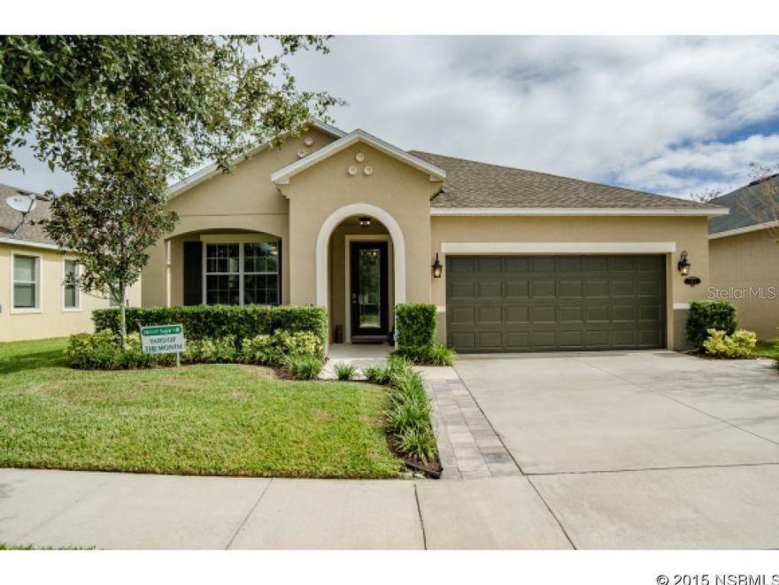 Fantastic home in the Isles of Sugar Mill subdivision.  This 3 bedroom, 2 bathroom home plus a Den offers a large open floor plan that has great views of the lake.  The kitchen is updated with beautiful wood cabinets and solid surface counters to fit your needs.  This home is just waiting for you to move in to.  The community has a swimming pool, a playground, and a walking trail that circles the neighborhood.  Look no further, this is the one. ;Water: City