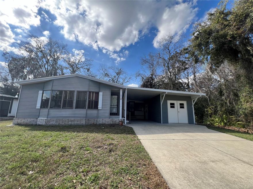 This home needs YOU!! Call Us today!!  Great location in the community! Extra lot too!  Major Price Improvement! Don't miss this rare opportunity to own a charming 2-bedroom, 2-bathroom home full of potential and character. From the moment you step inside, you’ll appreciate the spacious layout, featuring a large front living room, a welcoming foyer with coat closet, and a cozy kitchen perfect for any home chef. Enjoy meals in the formal dining room, and take advantage of the bonus Florida room—ideal for relaxing, entertaining, or converting into a hobby space.

The home also offers inside laundry, generously sized bedrooms, and plenty of cabinetry and storage throughout. Outside, you’ll find a double driveway for extra parking, a huge shed, and a private lot that includes an additional parcel, giving you even more room to spread out or expand.

Located in a vibrant, gated golf community just 2 miles from The Villages, this home comes with a Resident Owner Certificate and Golf Membership, so you can enjoy the active Florida lifestyle to the fullest.

Whether you're looking to customize your forever home or invest in a spacious retreat near everything—this is the one you've been waiting for. Schedule your showing today and start your Florida adventure!